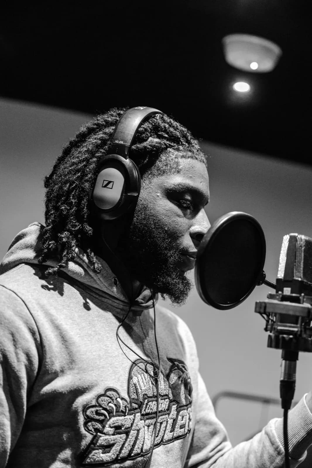 Vocalist in booth, B&W
